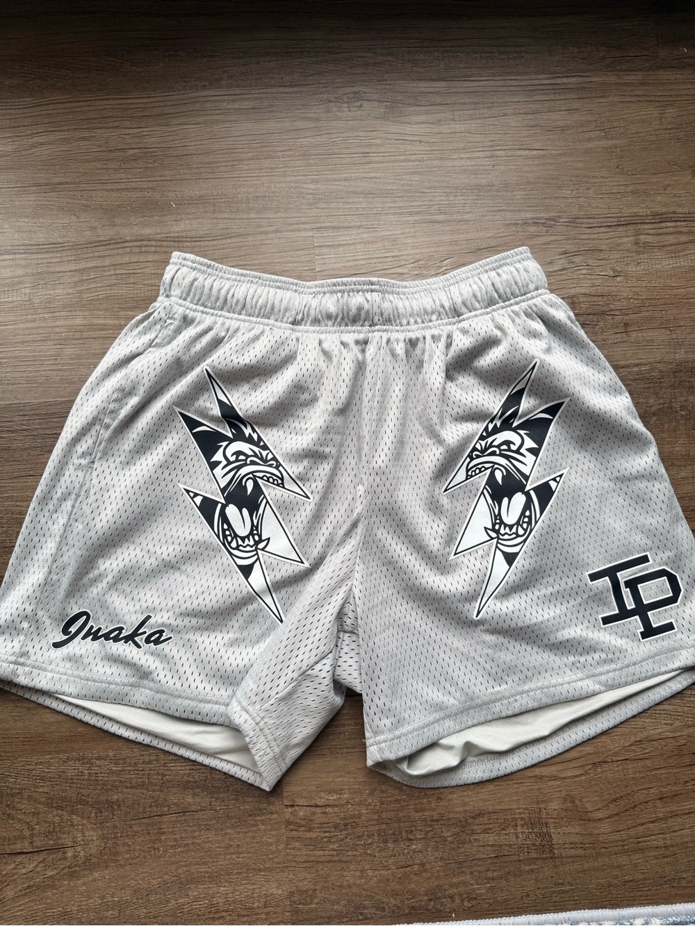 Inaka Power Light Gray Athletic Mesh Shorts with Black Graphics